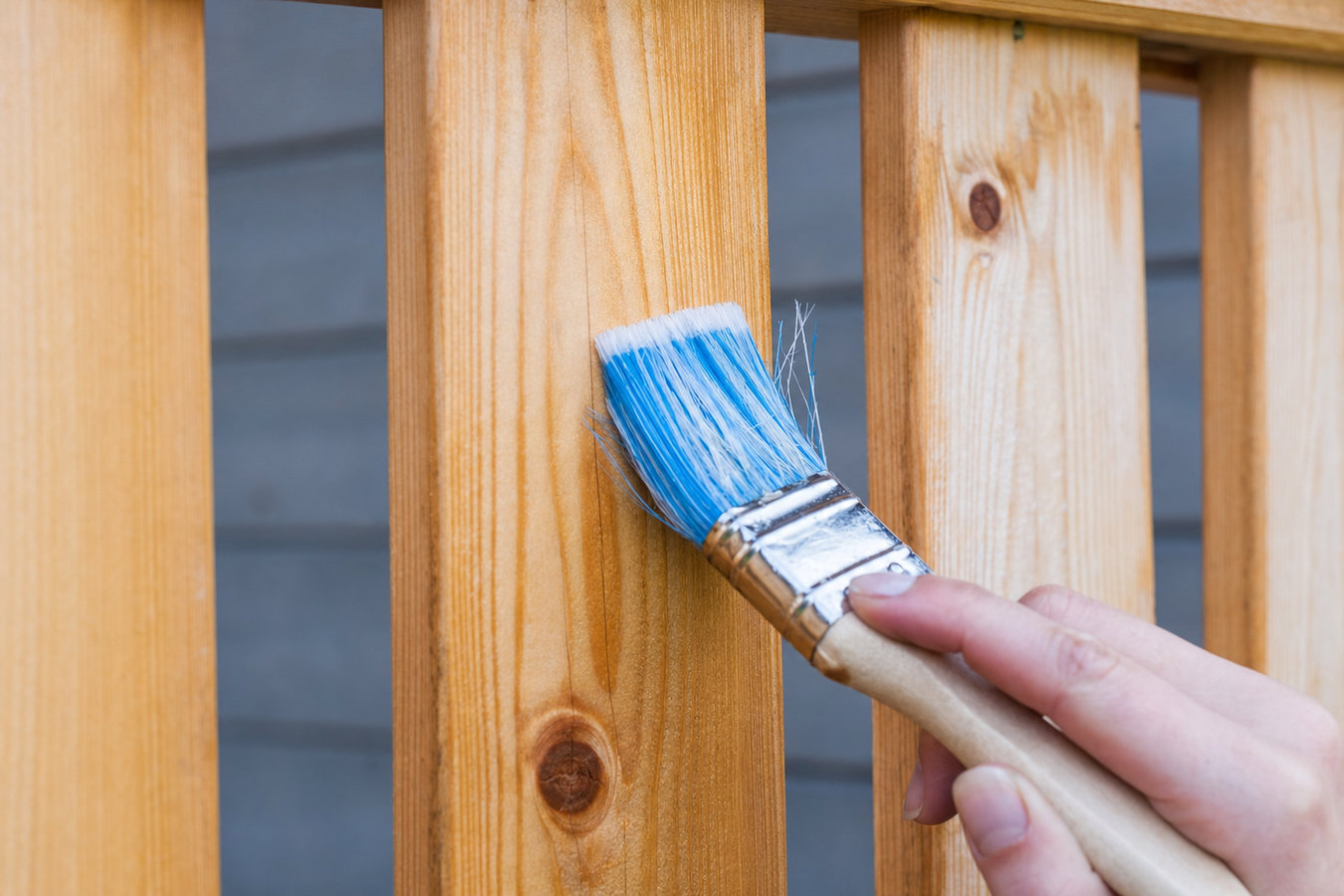 Fence staining and sealing